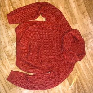 Pumpkin colored knitted sweater